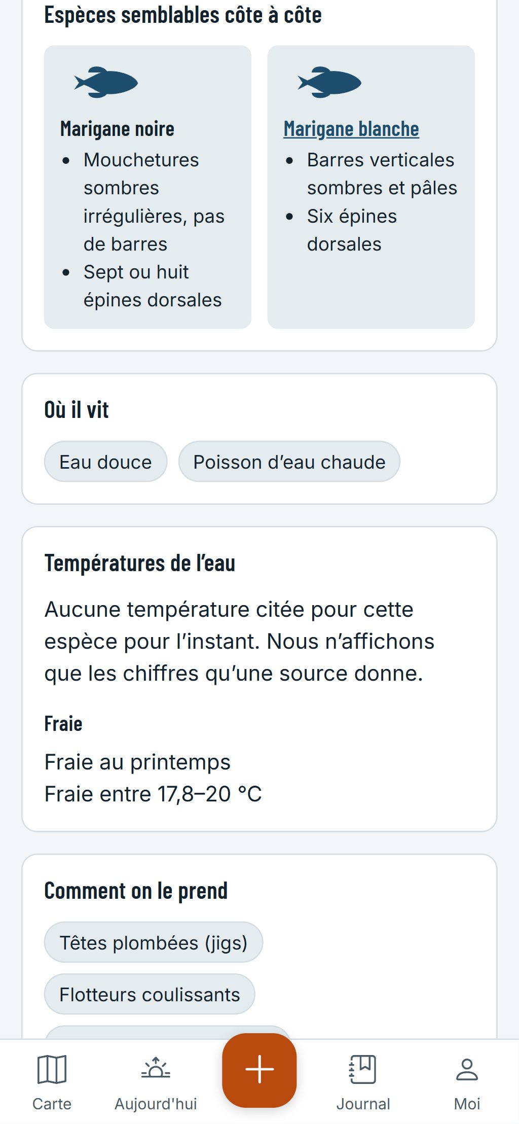 Le guide des espèces sur un téléphone : une marigane noire et une marigane blanche côte à côte, avec les marques qui les distinguent.