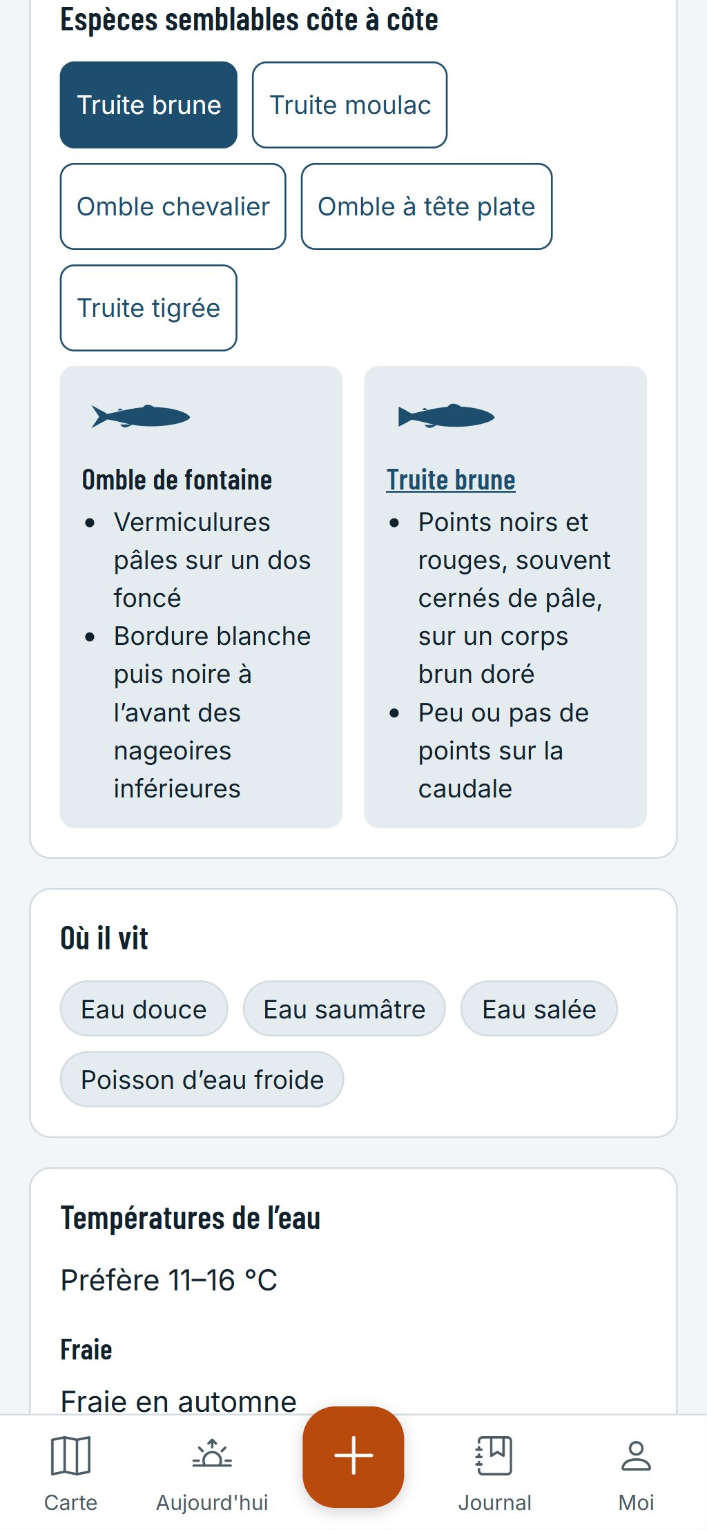 Le guide des espèces sur un téléphone : un omble de fontaine et une truite brune côte à côte, avec les marques qui les distinguent.