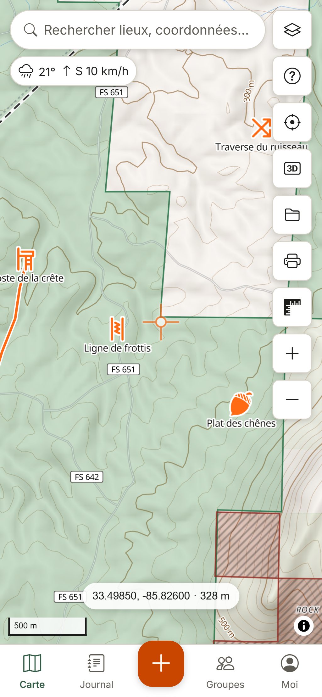 HuntGrid sur un téléphone : la même forêt avec la température, le vent et les repères du chasseur.