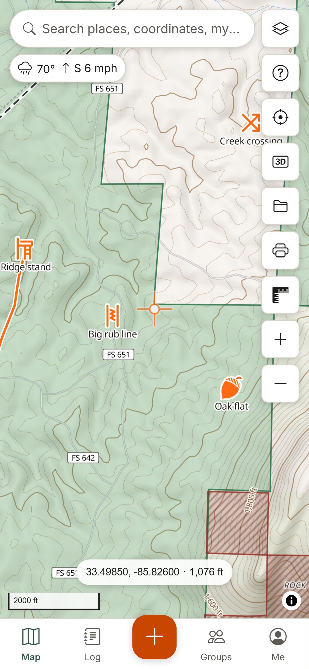HuntGrid on a phone: the same forest with the current temperature and wind, and the hunter's pins.